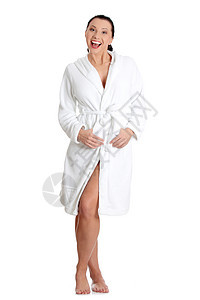 洗完澡后美丽的caucosian女人微笑浴衣奢华青少年护理温泉福利化妆品皮肤毛巾图片