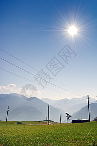 农村风景太阳农场晴天蔬菜蓝色日光草地天空爬坡环境图片