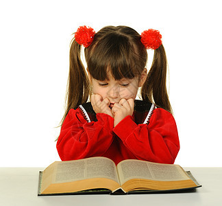 在大科学书前的小女孩孩子们专注好奇心学习教科书沉思女孩智慧童年文学图片