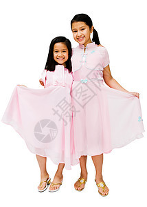 女孩出演的肖像鞋类姿势孩子们裙子团结衣服女孩们白色幸福姐姐图片