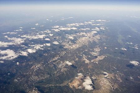 云上飞翔旅行天空阳光天气自由空气季节蓝色地平线气象图片