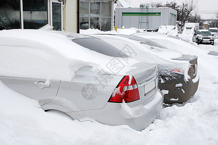降雪的极端情况 车在雪中雪堆天气街道风暴暴风雪汽车车辆气候城市季节图片