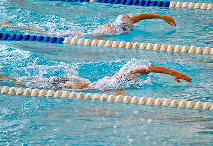 游泳运动员竞赛运动蝴蝶游泳衣海浪活力仰泳游戏飞溅游泳者图片