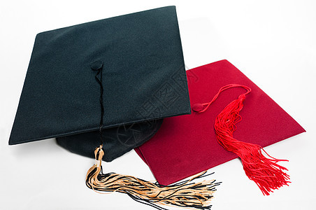 黑色和红色的毕业帽 带贝壳图片