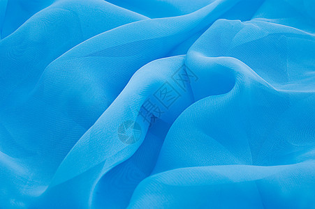 蓝丝纺织品海浪海洋布料风格折叠曲线丝绸窗帘桌面背景图片