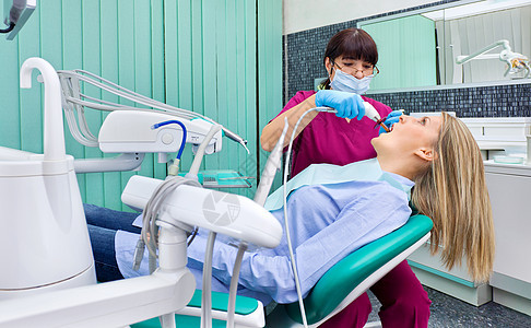 牙医工作病人手术牙科口服外科牙齿仪器女性卫生医生图片
