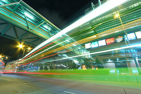 夜里在香港市中心贩卖城市商业戏剧性运动旅行公共汽车场景景观隧道街道图片