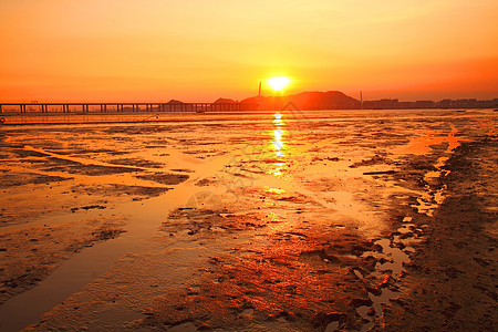 沿海日落天空天气热带反射阳光地平线晴天旅行海岸海滩图片