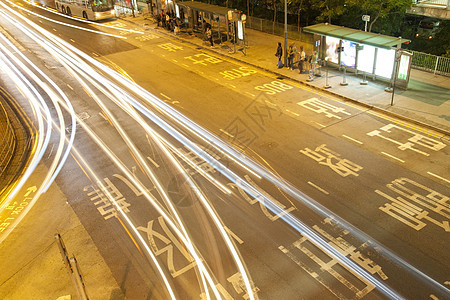 夜间城市交通景观场景公共汽车辉光天空运输运动摩天大楼日落地标图片