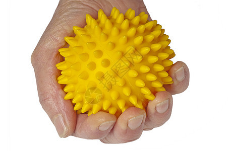 手与按摩球皱纹软化医疗黄色康复起皱皮肤放松治疗背景图片