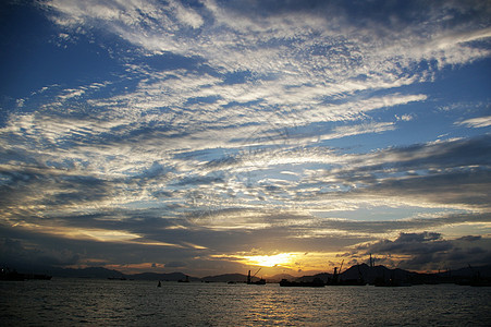 香港日落海景地平线阳光反射天堂海岸线建筑技术剪影海洋图片