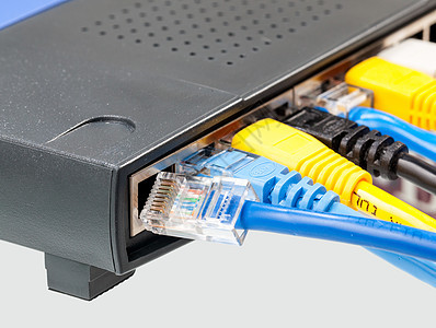 Cat 5 路由器中多种颜色的电缆白色黄色插座上网局域网灰色技术电脑互联网插头图片