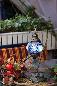 以阿拉伯方式用秋季水果和蔬菜特写马赛克混合灯桌子宏观时间食物图片