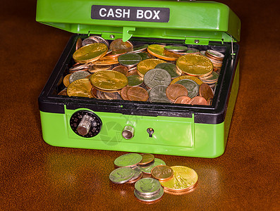 带金银硬币的绿色现金箱密码订金贮存胸部金库守护货币金融盒子安全图片