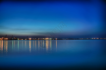 夜间海岸线金子日落城市旅行市中心日出反射风景海滩全景图片