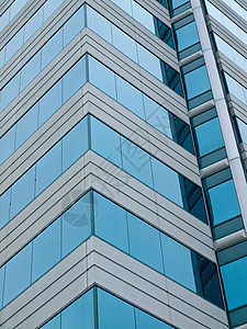 高楼办公室大楼 由混凝土和玻璃制成反射镜子蓝色市中心技术公司工作积分金融市场图片