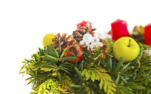 圣诞花圈植物庆典花环蜡烛锥体松树水果礼物叶子浆果图片