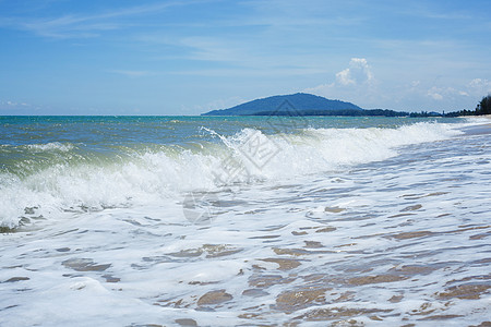 沙海和蓝海的波浪支撑海滩海景晴天波纹热带海浪冲浪液体太阳图片