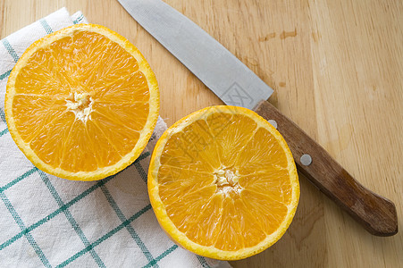刀切新鲜橙子图片