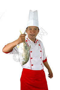 厨师拿着一头大生鱼炊具职业美食餐厅帽子盘子烹饪食物工作服赞成图片