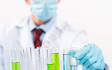 在实验室工作的科学家们成人男人生物学科学女性外套烧瓶科学家烧杯技术图片