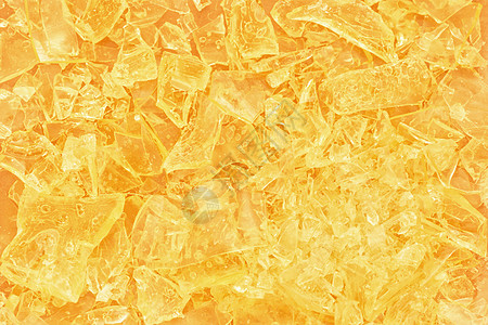 彩色晶晶背景冻结橙子边缘光谱钻石坡度宏观金子宝石反射图片