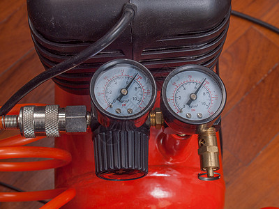 空气压缩机压力计管道测量管子软管压缩机红色工具橙子压力力量图片