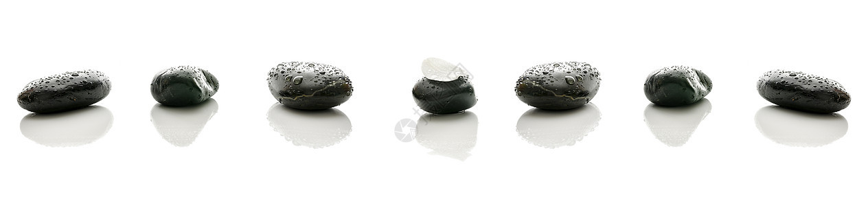 斯帕石头卫生按摩卵石花瓣热带黑色白色冥想概念治疗图片