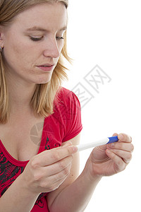 接受怀孕测试的妇女检查女性女士成人压力生育力阅读背景图片