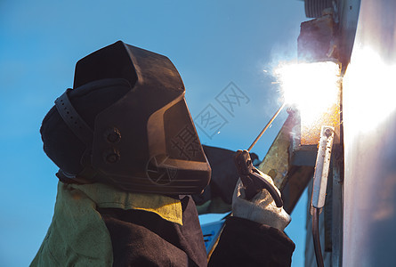 焊焊工力量建筑手套眼镜工具制造业火花材料帆布蓝色图片