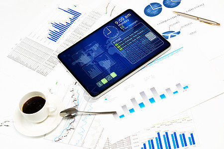 平板 财务单据和咖啡杯标题文章简报平衡咖啡成就蓝色软垫市场工具图片