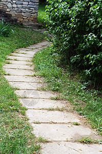 石头小路春季时间 花园路叶子途径森林荒野环境花园远足危险场景人行道背景