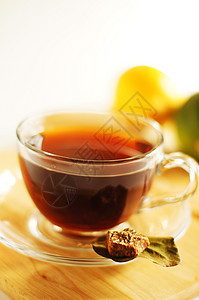 一杯茶和柠檬蔬菜桌子餐具生活叶子甜点杯子液体饮食时间图片