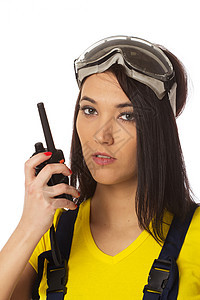 施工经理CB收音机特写肖像眼镜夹克讲话工作安全工人风镜女孩障碍女性图片