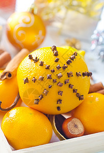 圣诞节新鲜橙子和肉桂环境芳香水果展示香料风格香气星星丝带食物图片