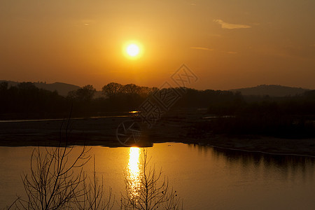 日落日出太阳场景阳光天空地平线黑色海岸流动天际图片