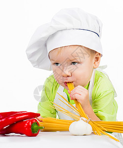 婴儿面条有意大利面的男孩男性午餐乐趣微笑孩子美食厨师男生盘子烹饪背景