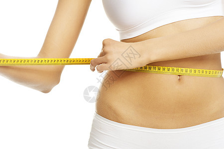 穿白色内裤 带测量胶带的妇女腹部重量营养健身房训练美丽减肥肥胖身体腰围图片