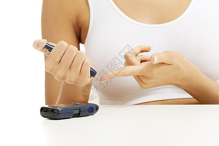测量葡萄糖水平的糖尿病患者桌子疾病女性测试乐器手指样本皮肤药品检查图片