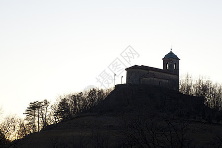 斯洛文尼亚雪地教堂圣玛利亚日落农村精神信仰教会背景图片