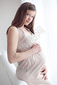 怀孕母性福利沙发肚子女性成人女士母亲裙子房间图片