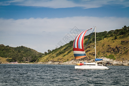 泰国普吉岛天空爬坡海洋蓝色建筑钓鱼旅行海滩背景图片