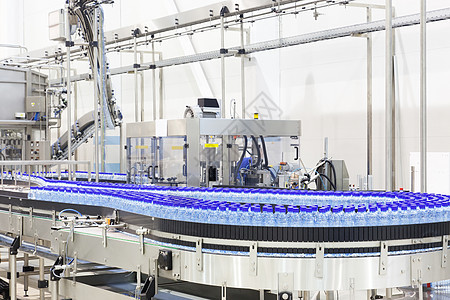 现代矿泉水加注工业商店生产自动化瓶子塑料工厂工具机械矿物机器输送带图片
