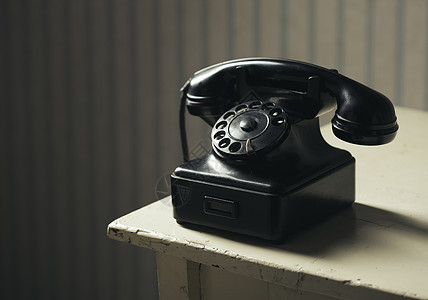 旧式电话用品电缆电话线沟通家居旋转设备黑色固定电话乡愁图片