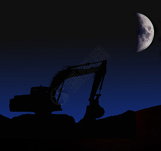 建筑工地一张巨型推土机与月亮之夜的照片背景