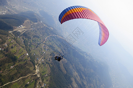 尼泊尔的坦迪姆滑坡爱好高度翅膀旅游天空活动爬坡闲暇绿色阳台图片