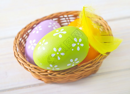 复活节鸡蛋蓝色假期节日篮子桌子团体丝带风格装饰季节图片