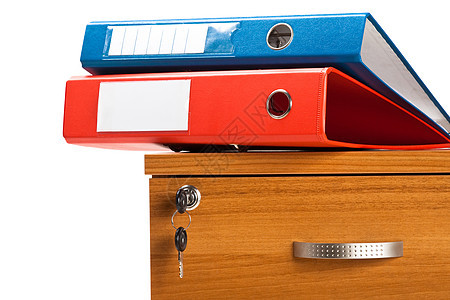 放置在柜子上的文件夹组织盒子抽屉学习档案家具工作文书办公室商业信息高清图片素材