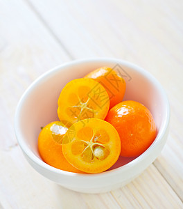 宽夸特橙子植物热带桌子椭圆形木板饮食木头果味水果图片