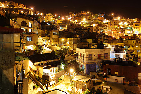 深夜的乡边村怀旧城市爬坡旅行家庭悲伤地标游客日落风景图片